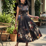 Greta | Abito Midi Plissettato a Fiori con Collo Alto e Apertura a Chiave