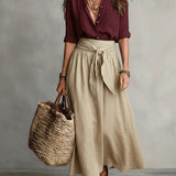 SAGE | Set di Due Pezzi: Top Nero e Gonna Midi Verde Oliva