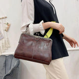 Borsa vintage con chiusura a scatto