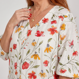 Cosima | Abito midi boho con stampa di fiori selvatici